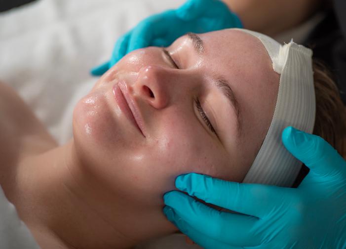 Woman relaxing during Zero Downtime Peel session at Massage Envy. 