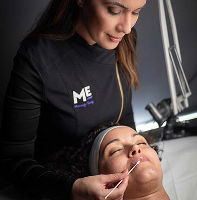 Esthetician providing customized facial service