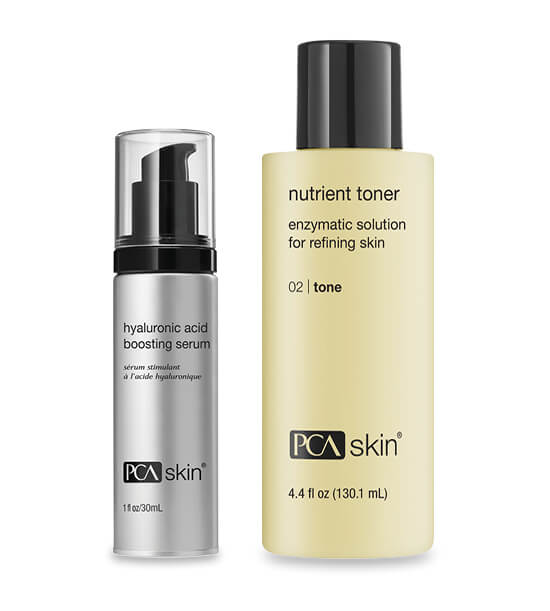 Bottles of hyaluronic acid boosting serum and nutrient toner from PCA Skin. 