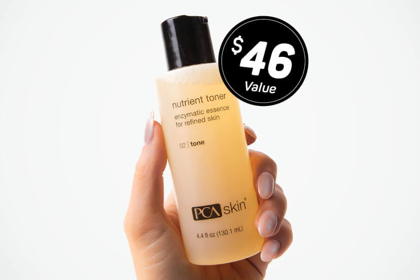 Close-up of a woman's hand holding a bottle of Nutrient Toner from PCA Skin. $46 value. 
